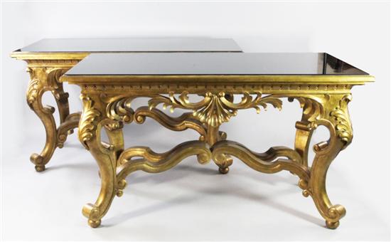 Pair of large Baroque revival carved giltwood console tables, by Christopher Guy, 5ft 4in. x 2ft 8.5in. x 3ft(-)